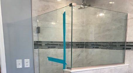 We replace and install new shower glass doors here in Pittsburgh—including this beautiful frameless glass shower enclosure!